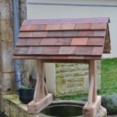 Réalisation et pose de couvertine décorative de puit